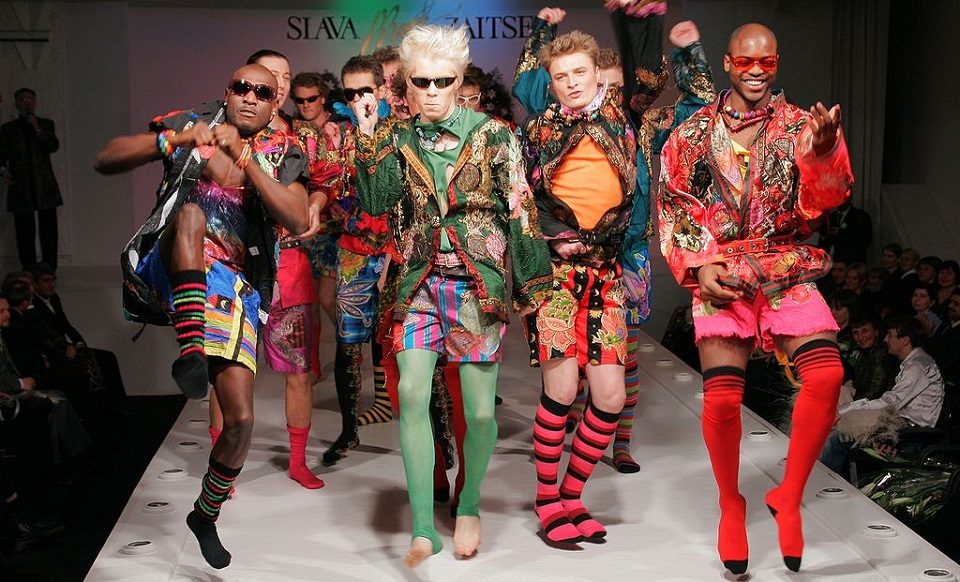 Image, Models wearing zany fashions on a catwalk.