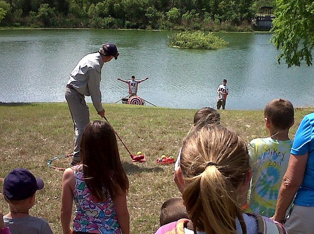 Image, golfer aiming for target.