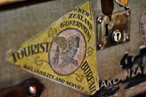 Image, stickers on old suitcase.