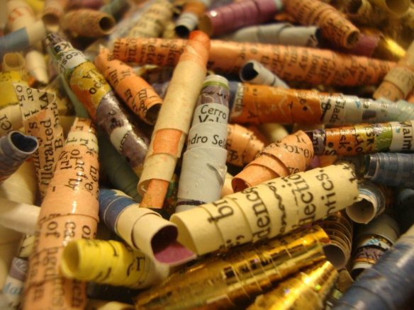 Image: Curled paper shavings from books.