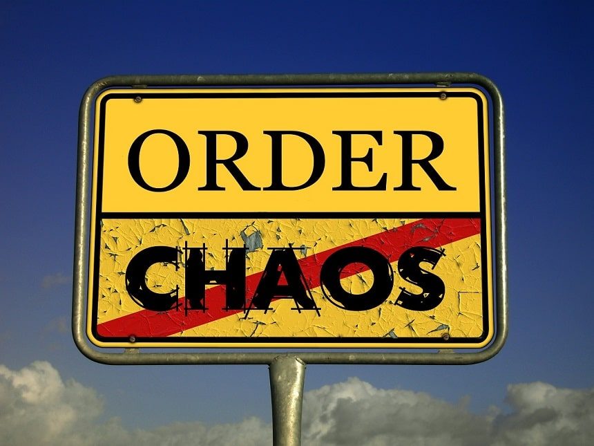 Image, yellow road sign with Order and Chaos written on it