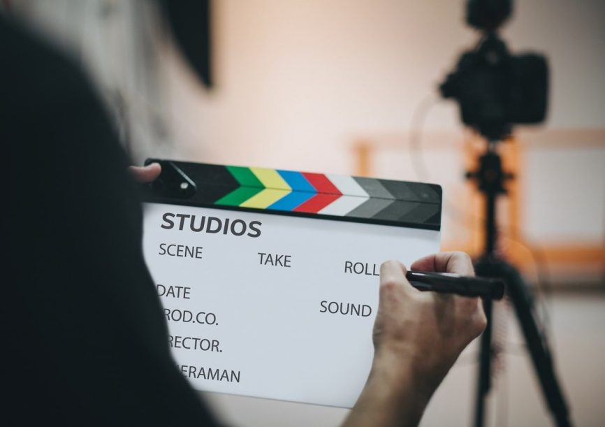 Image, clapper board being used on a film set.
