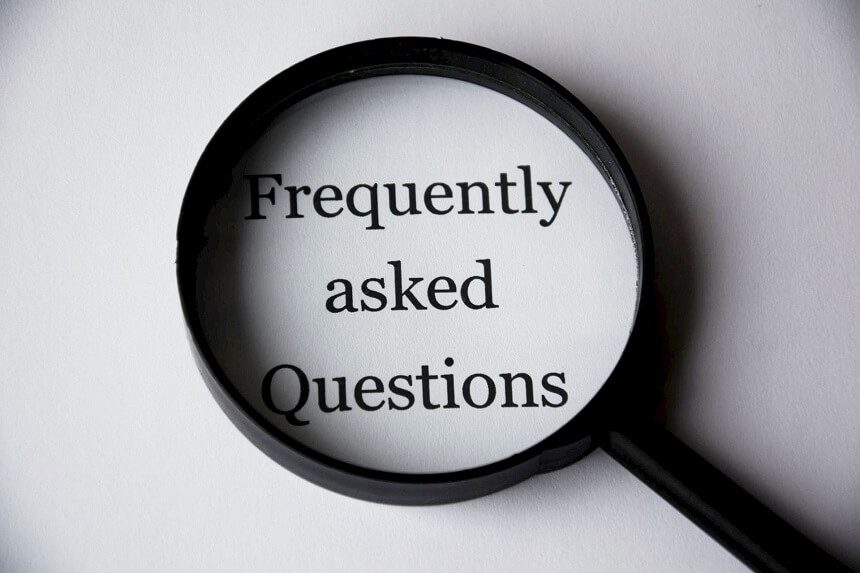 Image, old fashioned magnifying glass over the words 'frequently asked questions'
