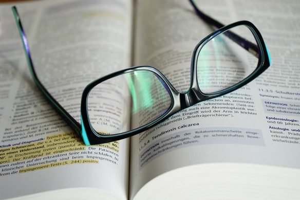 Photo of glasses with text.