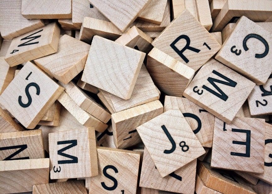Brown scrabble letters jumbled together
