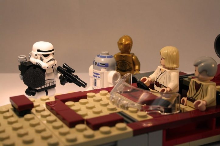 Image, Lego Luke Skywalker, Obi-Wan Kenobi and droids talk to a Stormtrooper.
