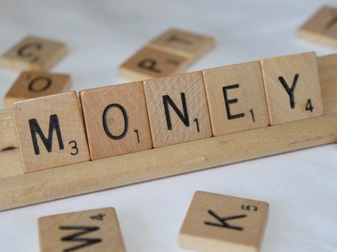 Image, 'money' made of scrabble letters.
