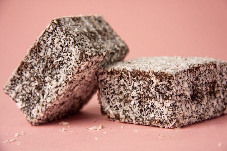 Close-up of two chocolate Lamingtons