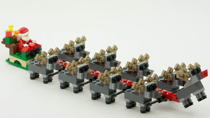 Image, a Lego Santa Claus in his reindeer-drawn sleigh