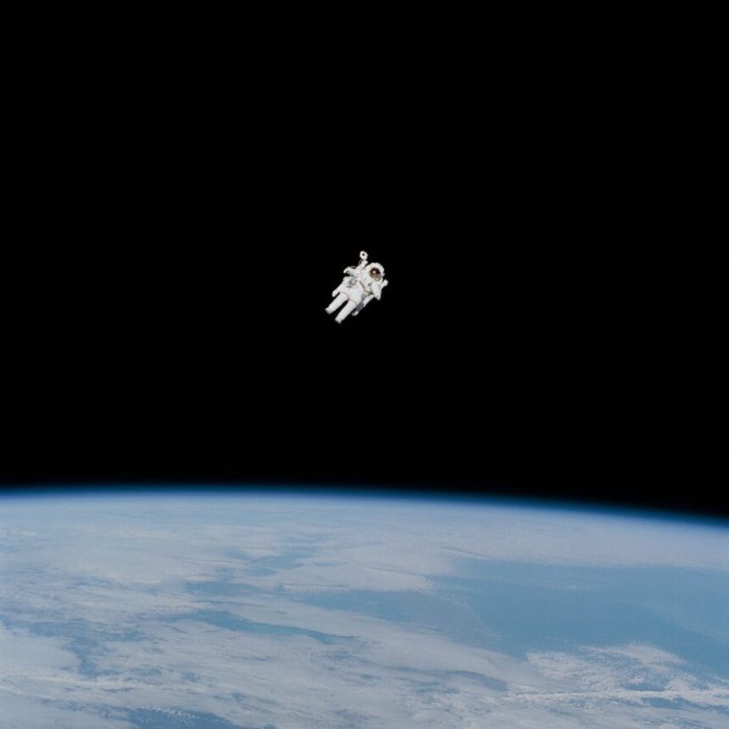 Image, Astronaut floating above space.