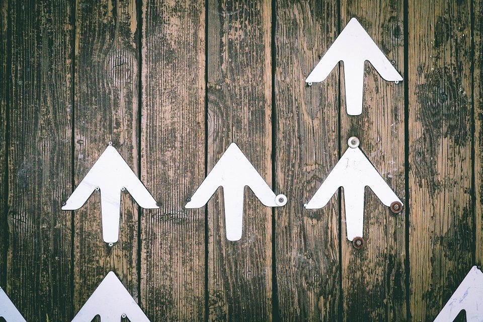 Image, Upwards arrows on a wall.