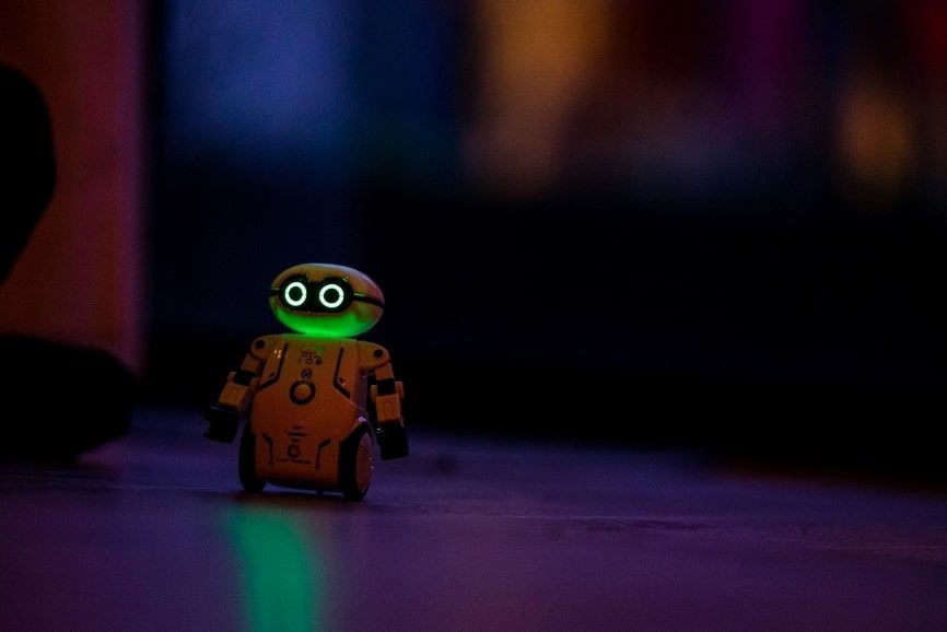 yellow and black glowing robot toy.