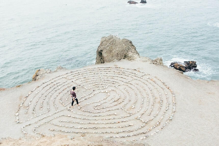 Image, person walking a rock labyrinth