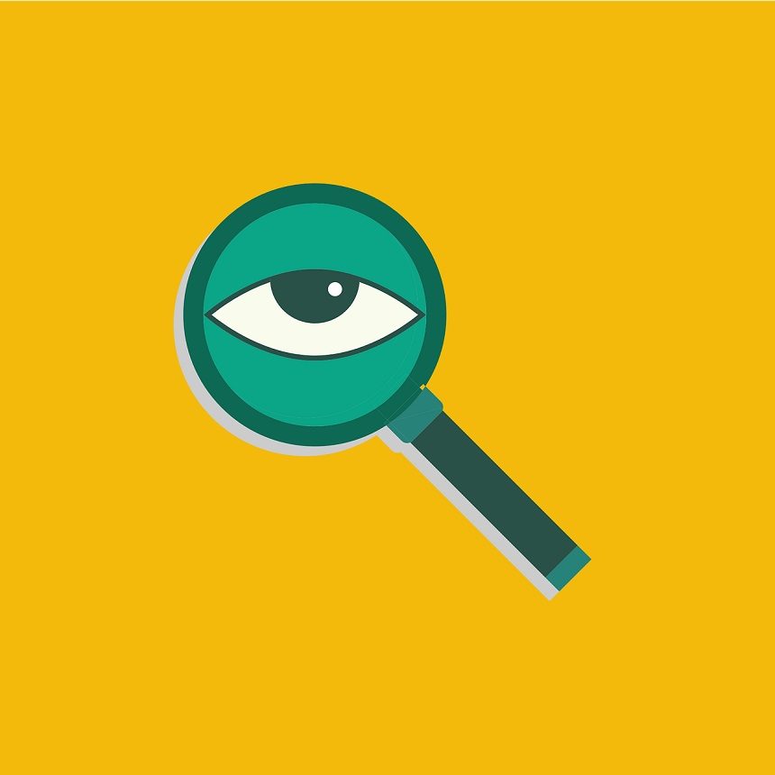 Image, green eye looking through a magnifying glass on a yellow background