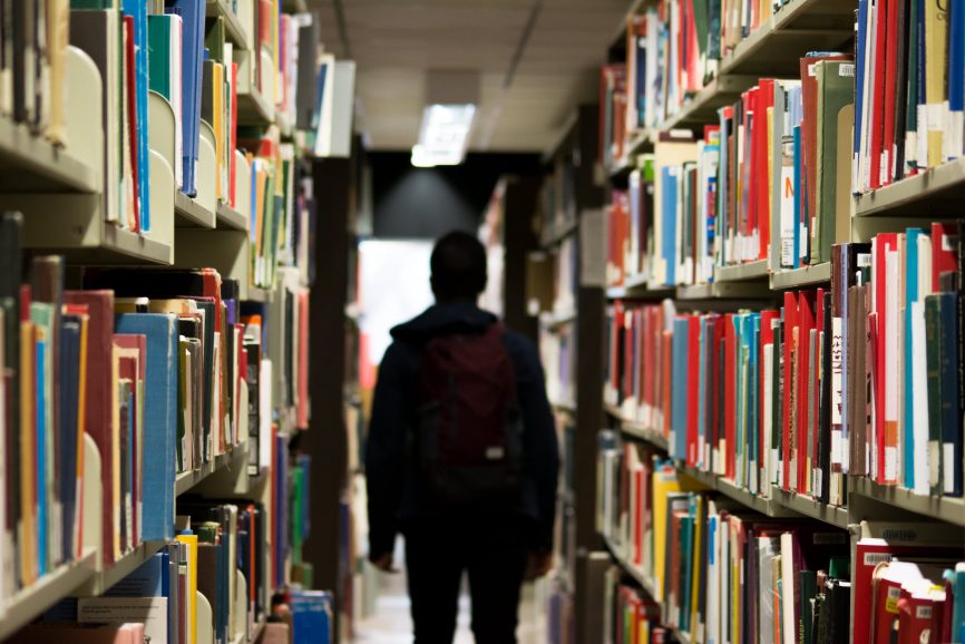 Image, Student in a library.