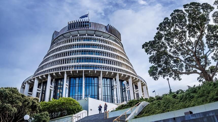 New Zealand’s round, tapering Parliament building, known as the Beehive, outlined against the skyline.
