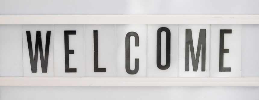 Black and white plastic Welcome sign