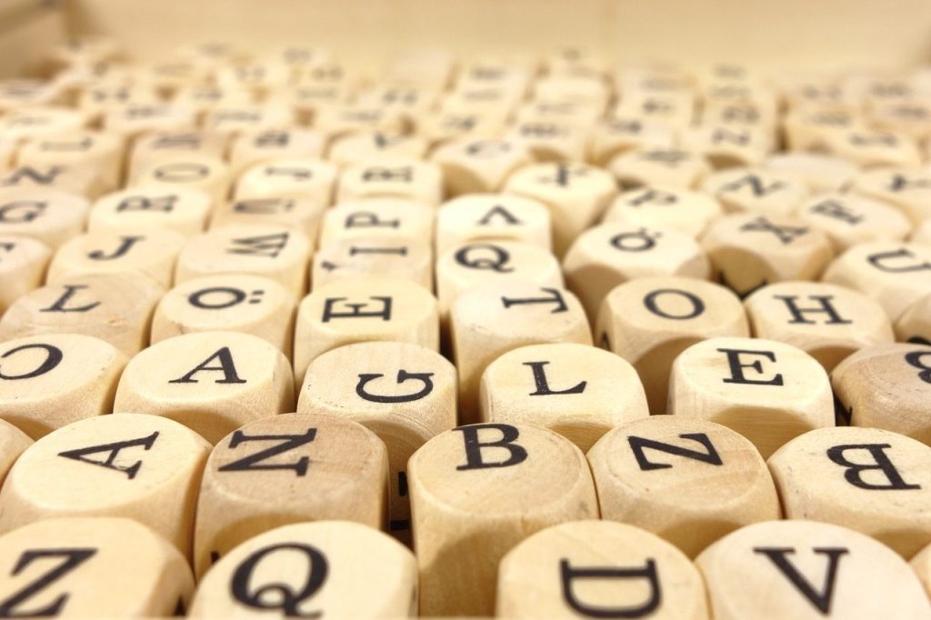 Wooden cube letters.