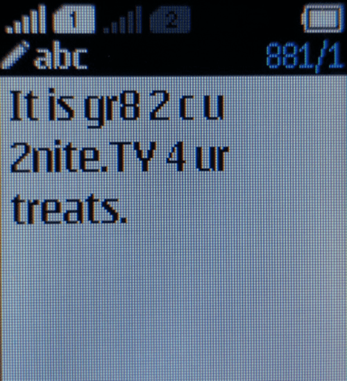 Text message with many abbreviations and numbers used instead of words.